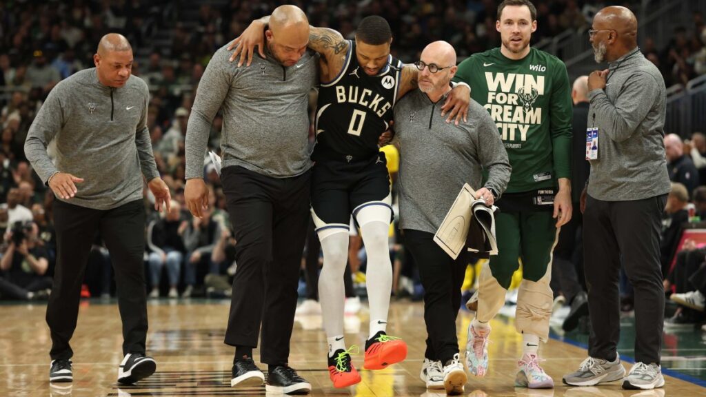 Enduring Pain: Damian Lillard's Achilles Tear Shakes Nba Aspirations