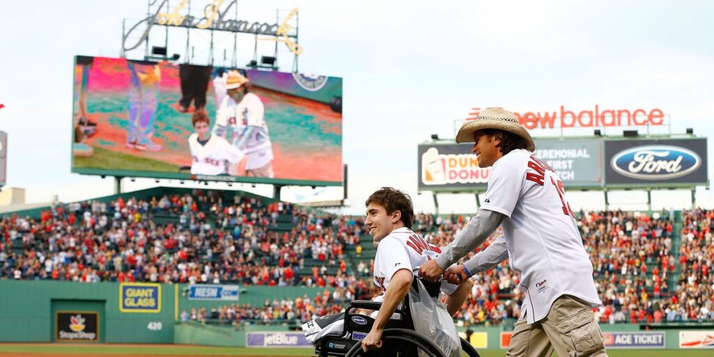 Boston bombing survivors defy odds: paralyzed runner conquers marathon in