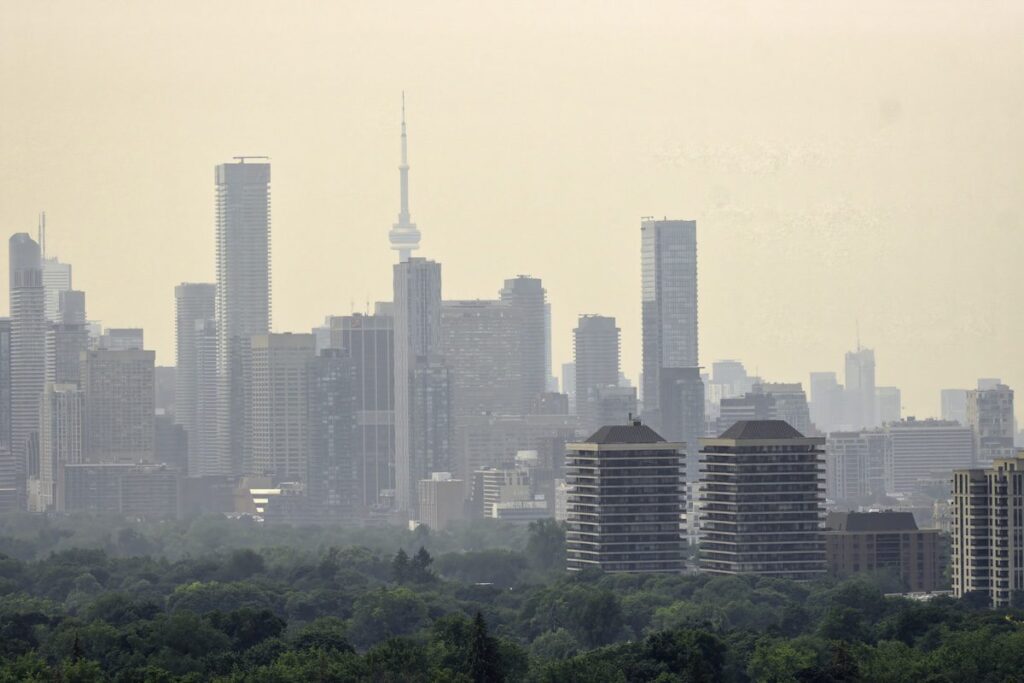 Toronto faces unhealthy air quality amidst wildfire crisis—consider postponing outdoor