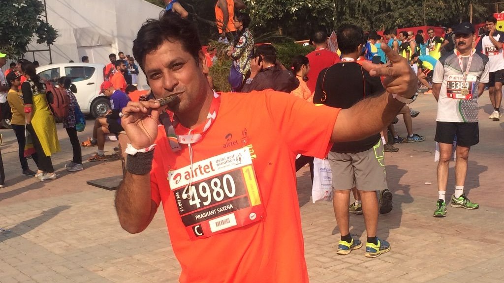 Twice Battling Cancer, Prashant Saxena Triumphs at Vedanta Delhi Half Marathon Twice battling cancer, prashant saxena triumphs at vedanta delhi half